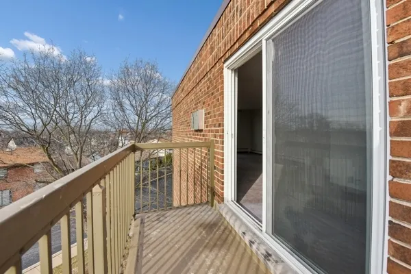 a bathroom with a sink toilet vanity and shower