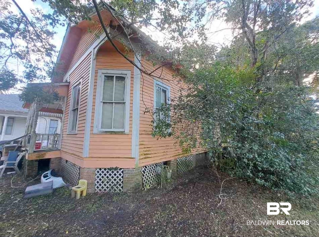 504 Charles Street Mobile, AL 36604 - Photo 1 of 6 View of side of property featuring crawl space