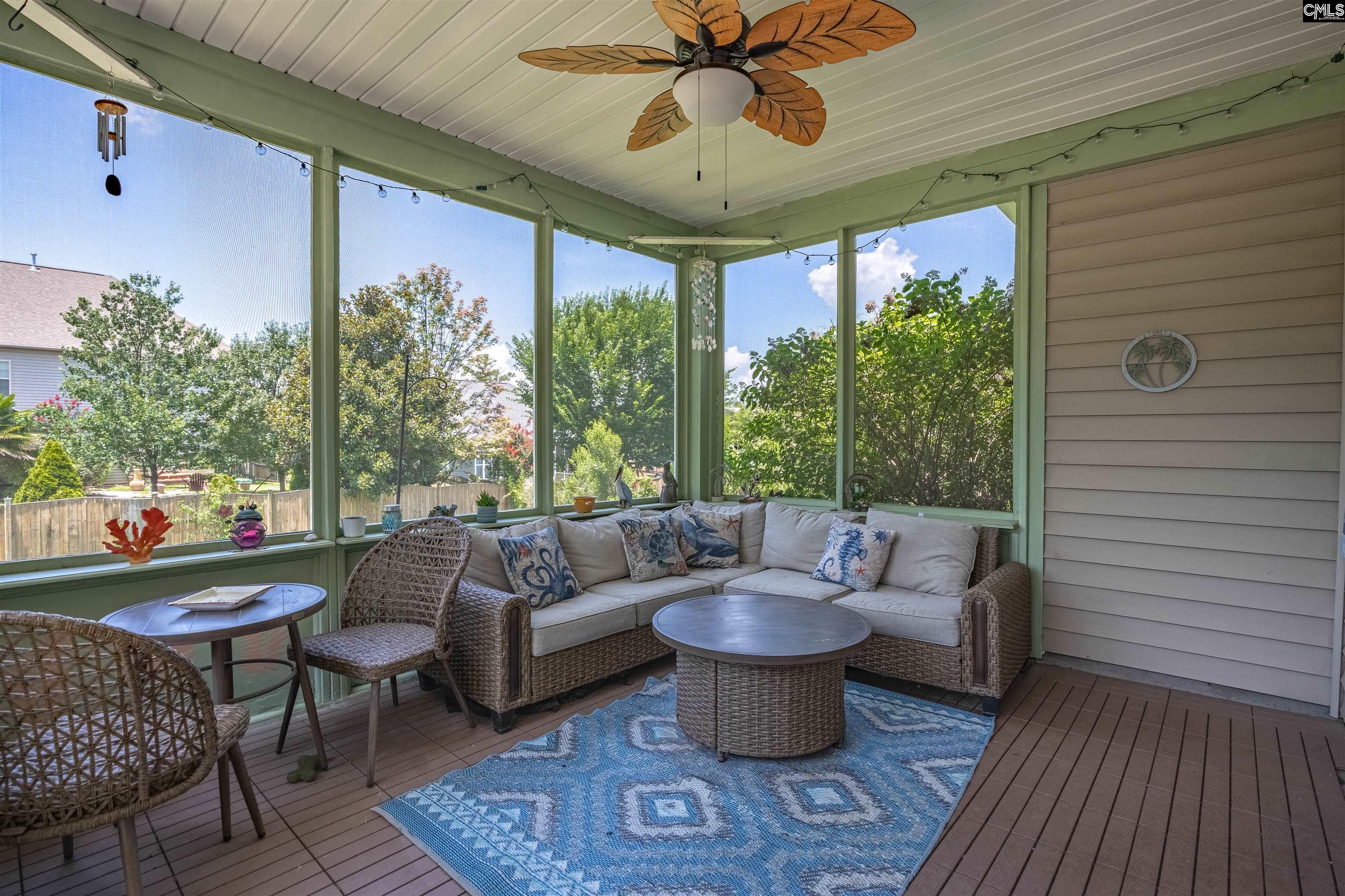 321 Asa Rose Lexington, SC 29072 - Photo 39 of 52 a living room with patio furniture and a potted plant
