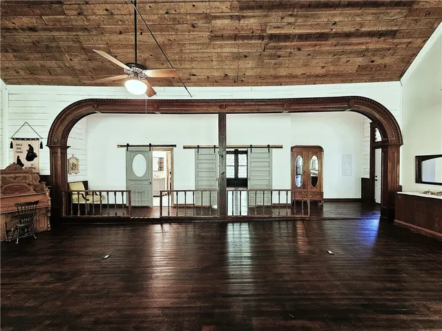 a view of livingroom with furniture and wooden floor