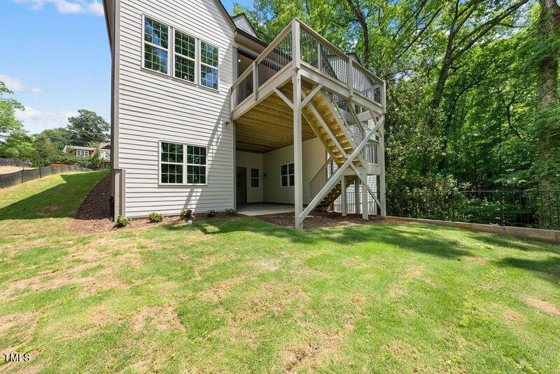 1805 Stillwater Drive Raleigh, NC 27607 - Photo 19 of 19 a view of a house with a backyard