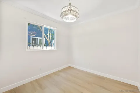 a bedroom with a bed and a closet