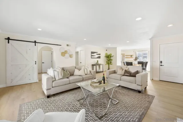 a living room with furniture and a couch