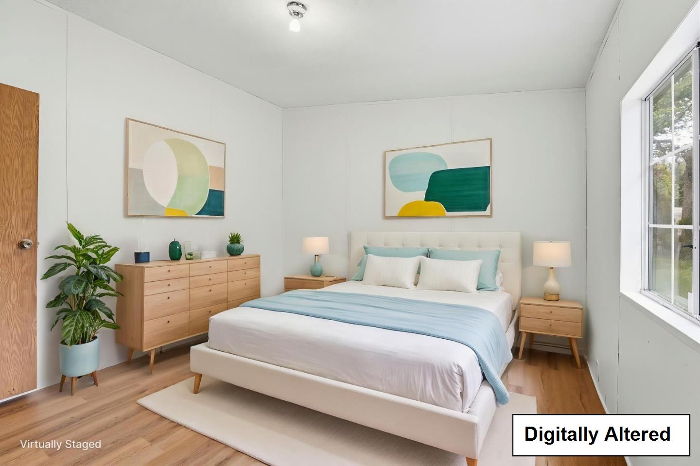 41800 Tassajara Road Carmel Valley, CA 93924 - Photo 14 of 51 a bedroom with a bed and a potted plant