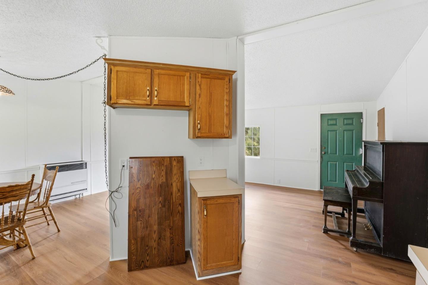 41800 Tassajara Road Carmel Valley, CA 93924 - Photo 24 of 51 a view of kitchen with furniture and wooden floor