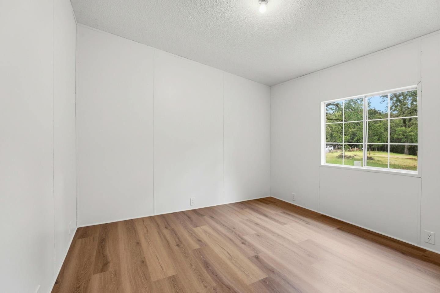 41800 Tassajara Road Carmel Valley, CA 93924 - Photo 31 of 51 an empty room with a window