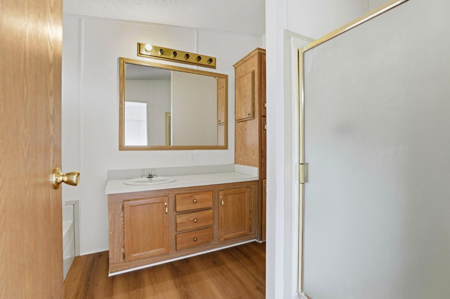 41800 Tassajara Road Carmel Valley, CA 93924 - Photo 35 of 51 a bathroom with a sink and a mirror