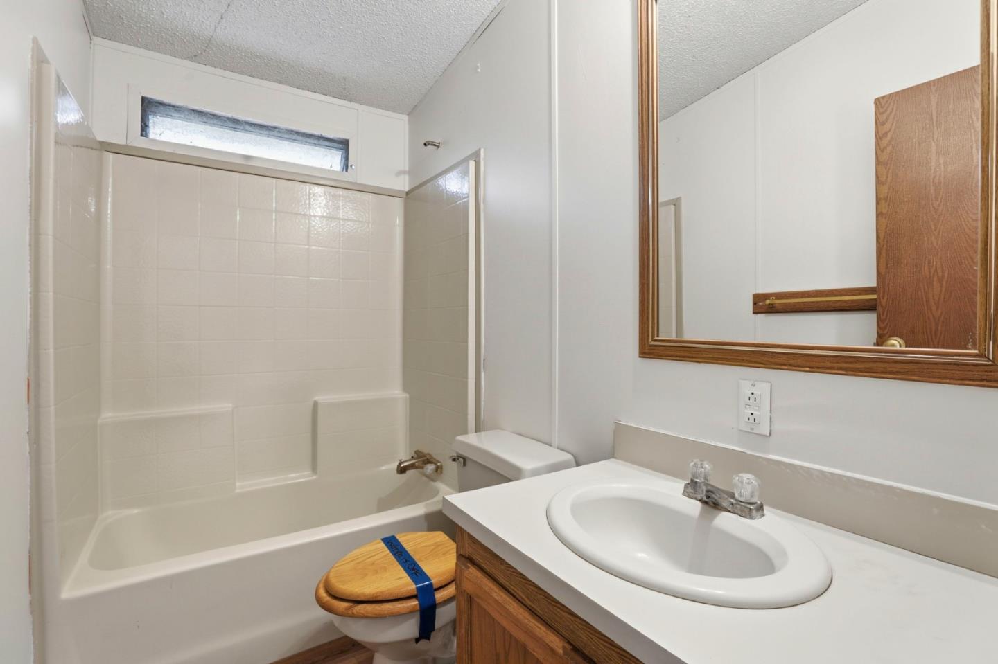 41800 Tassajara Road Carmel Valley, CA 93924 - Photo 37 of 51 a bathroom with a sink toilet and shower