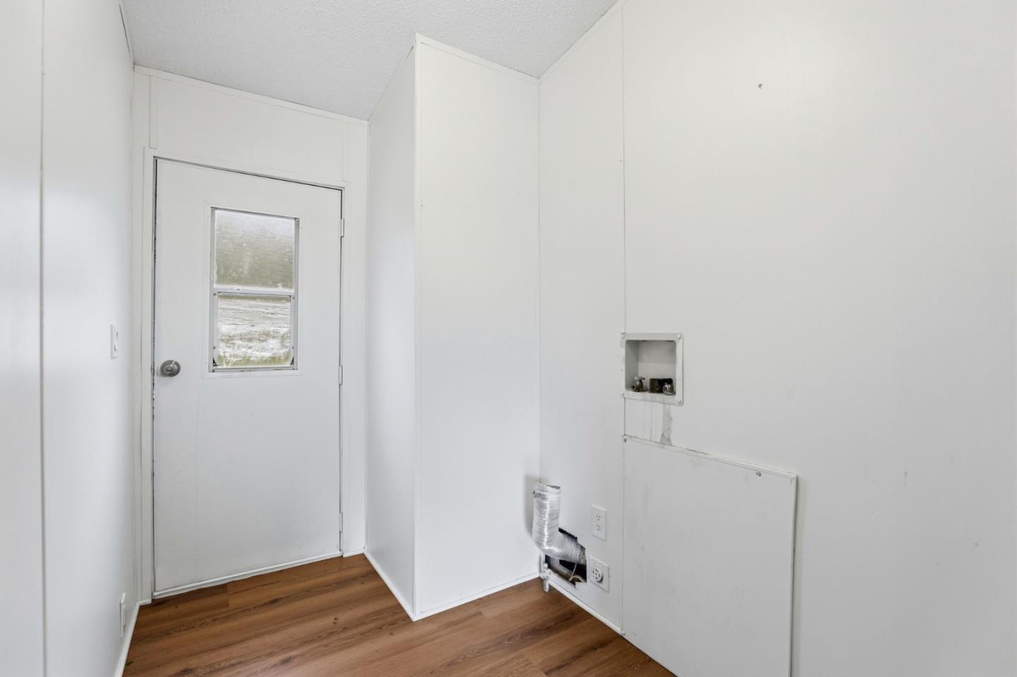 41800 Tassajara Road Carmel Valley, CA 93924 - Photo 38 of 51 a view of room with wooden floor