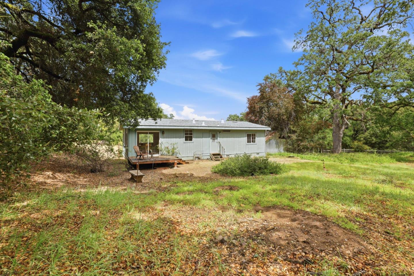 41800 Tassajara Road Carmel Valley, CA 93924 - Photo 43 of 51 a front view of house with yard and trees