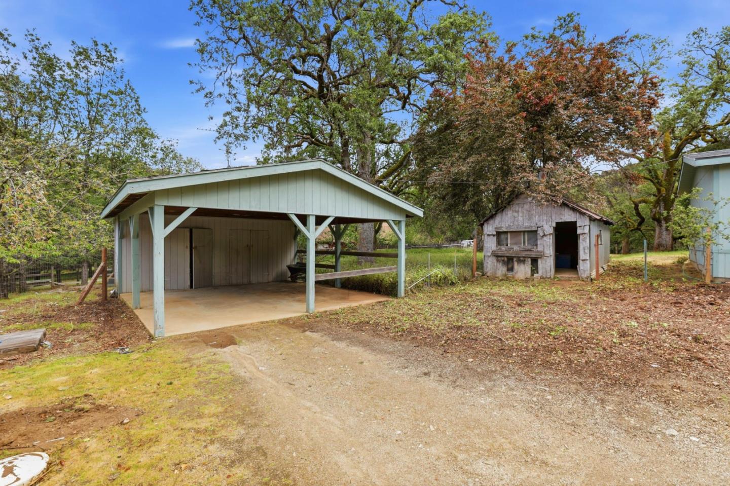 41800 Tassajara Road Carmel Valley, CA 93924 - Photo 45 of 51 a house with a tree in the background