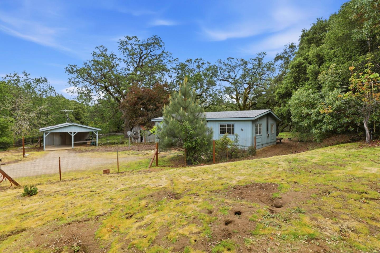 41800 Tassajara Road Carmel Valley, CA 93924 - Photo 7 of 51 a house view with a swimming pool