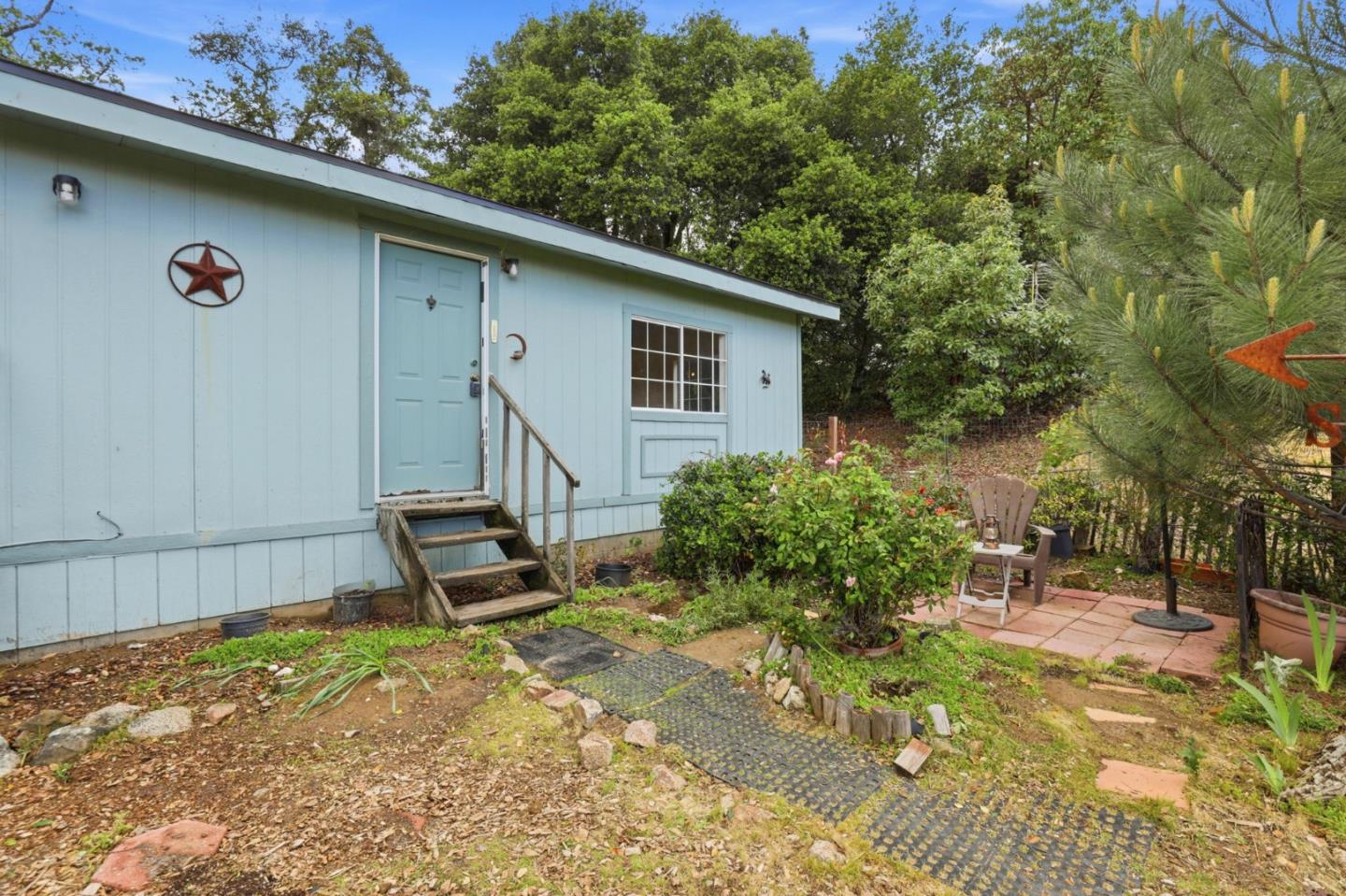 41800 Tassajara Road Carmel Valley, CA 93924 - Photo 10 of 51 a view of a backyard with sitting area