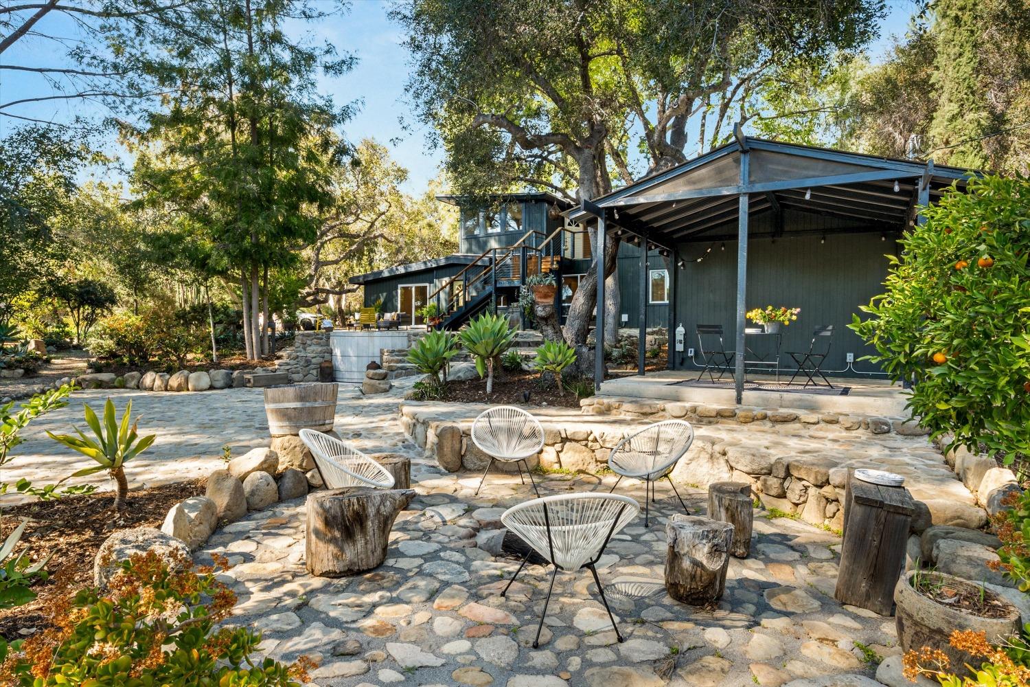 3541 Thacher Road Ojai, CA 93023 - Photo 15 of 50 a view of a lounge chair and table in the patio