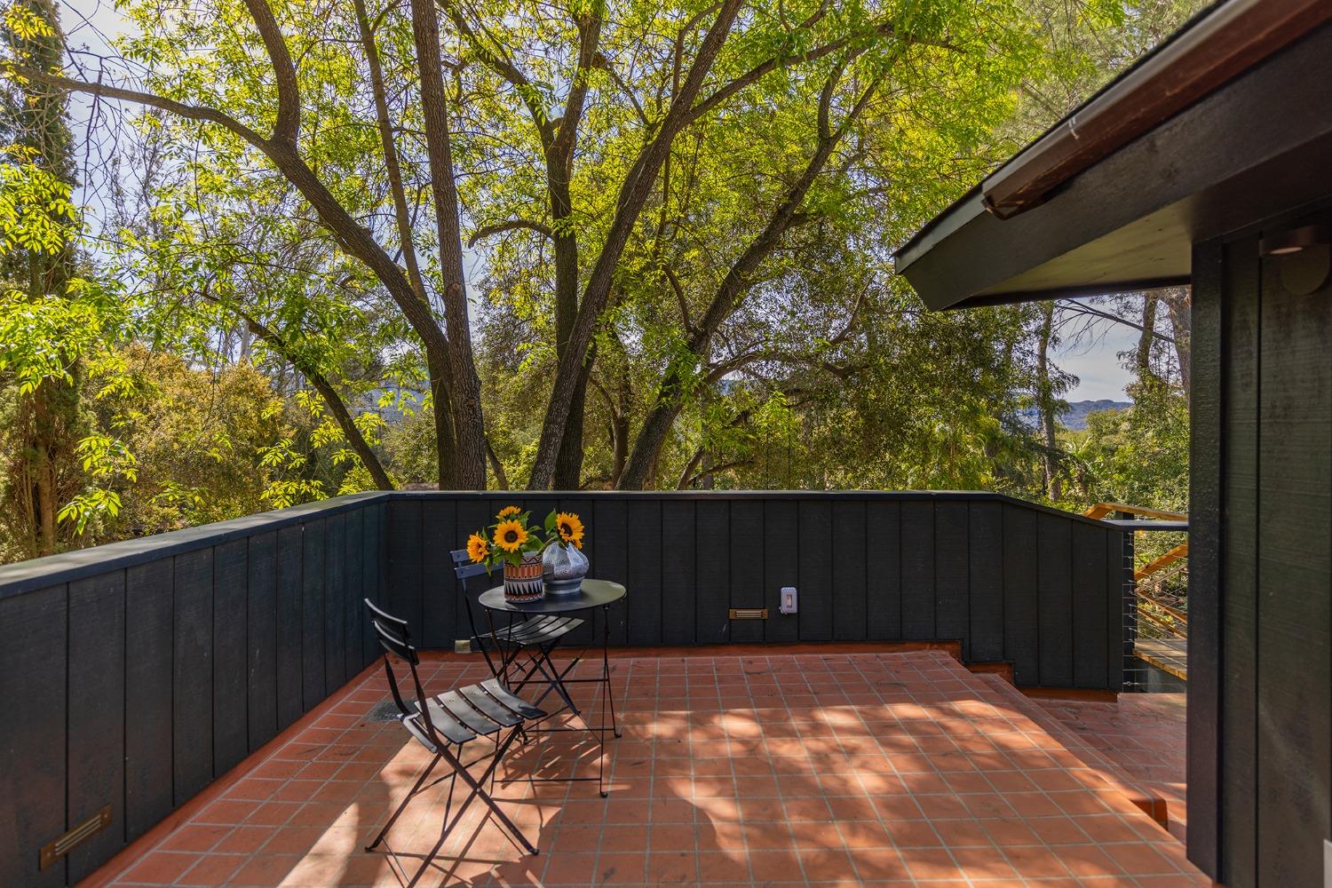 3541 Thacher Road Ojai, CA 93023 - Photo 23 of 50 a backyard of a house with table and chairs