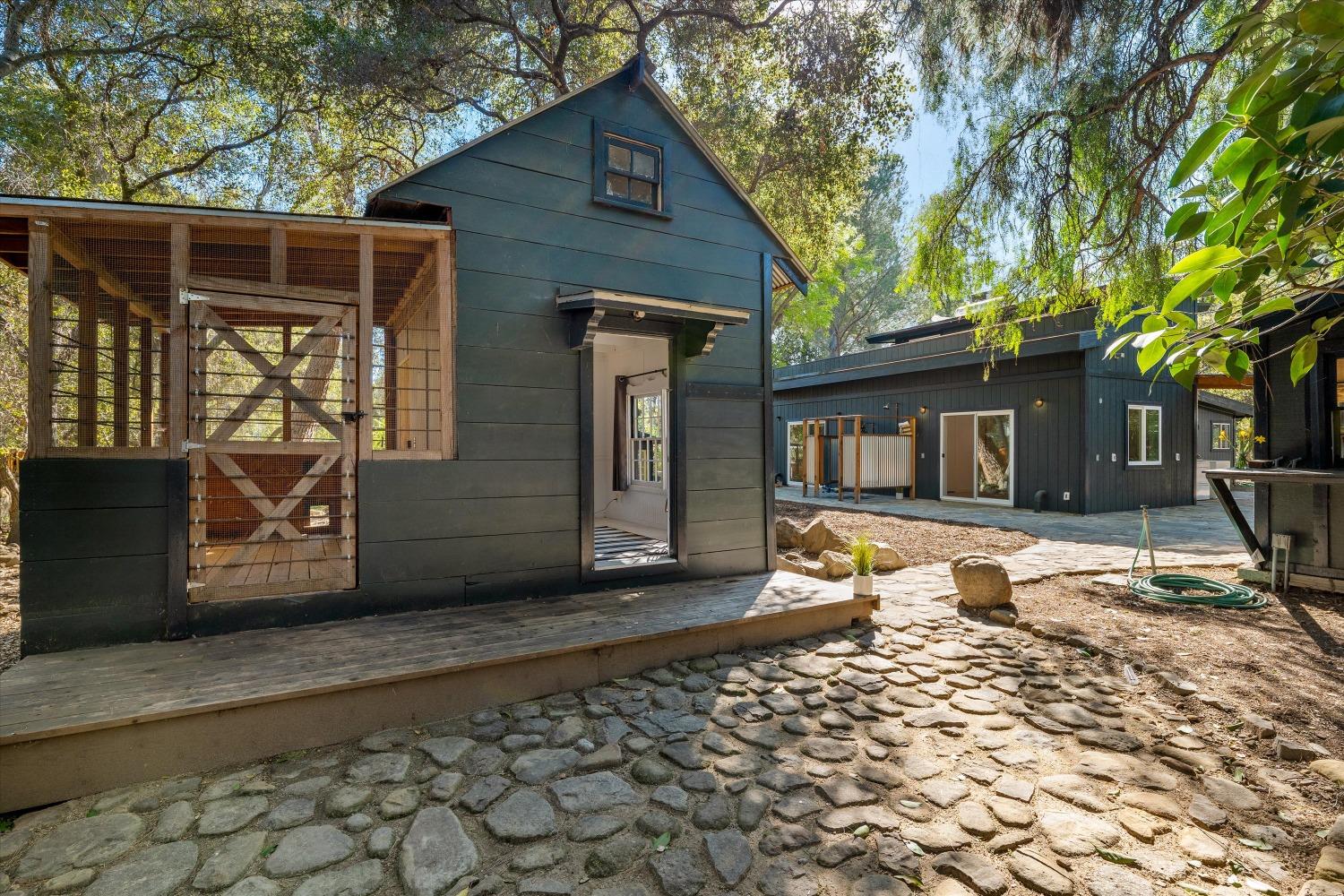 3541 Thacher Road Ojai, CA 93023 - Photo 32 of 50 a front view of a house with a yard