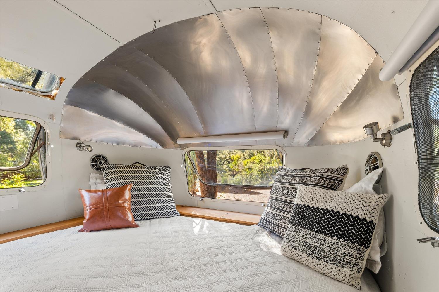 3541 Thacher Road Ojai, CA 93023 - Photo 38 of 50 a bedroom with a bed and a window