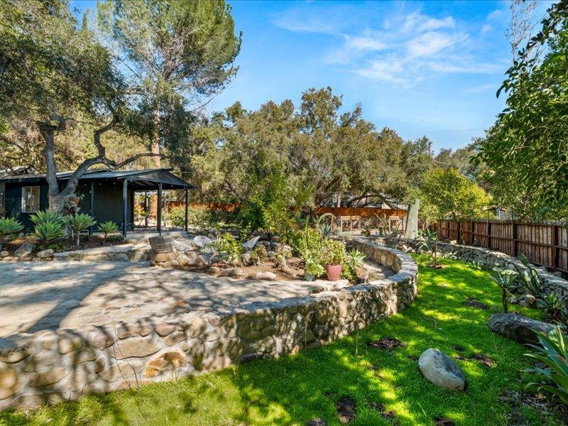 3541 Thacher Road Ojai, CA 93023 - Photo 42 of 50 a front view of a house with a garden