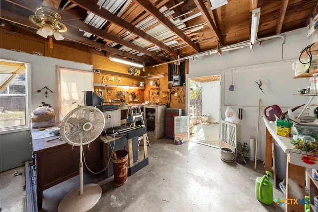 a view of a balcony with floor to ceiling windows with wooden floor