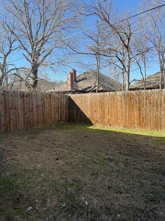 1221 Village Garden Azle, TX 76020 - Photo 13 of 23 a view of a backyard of the house