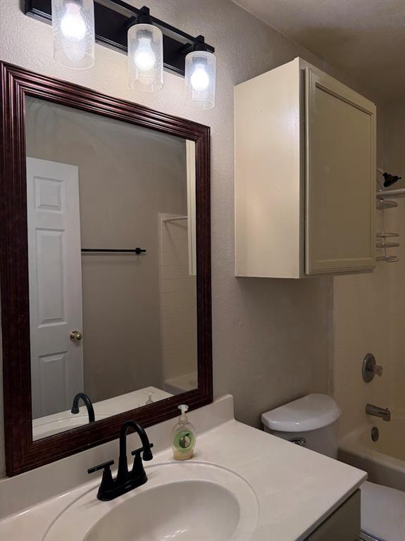 1221 Village Garden Azle, TX 76020 - Photo 18 of 23 a bathroom with a sink and a mirror