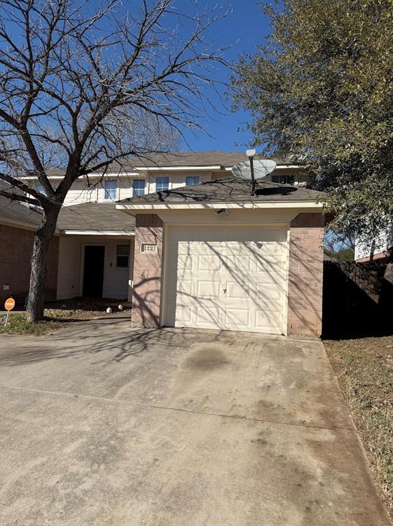 1221 Village Garden Azle, TX 76020 - Photo 3 of 23 a view of a house with a snow in the yard