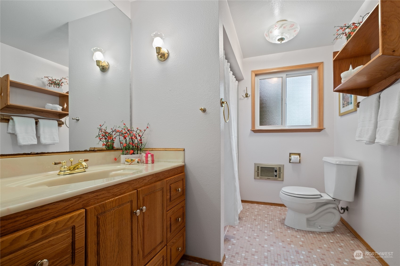 1801 224th Street Southwest Bothell, WA 98021 - Photo 14 of 24 a bathroom with a sink and a mirror