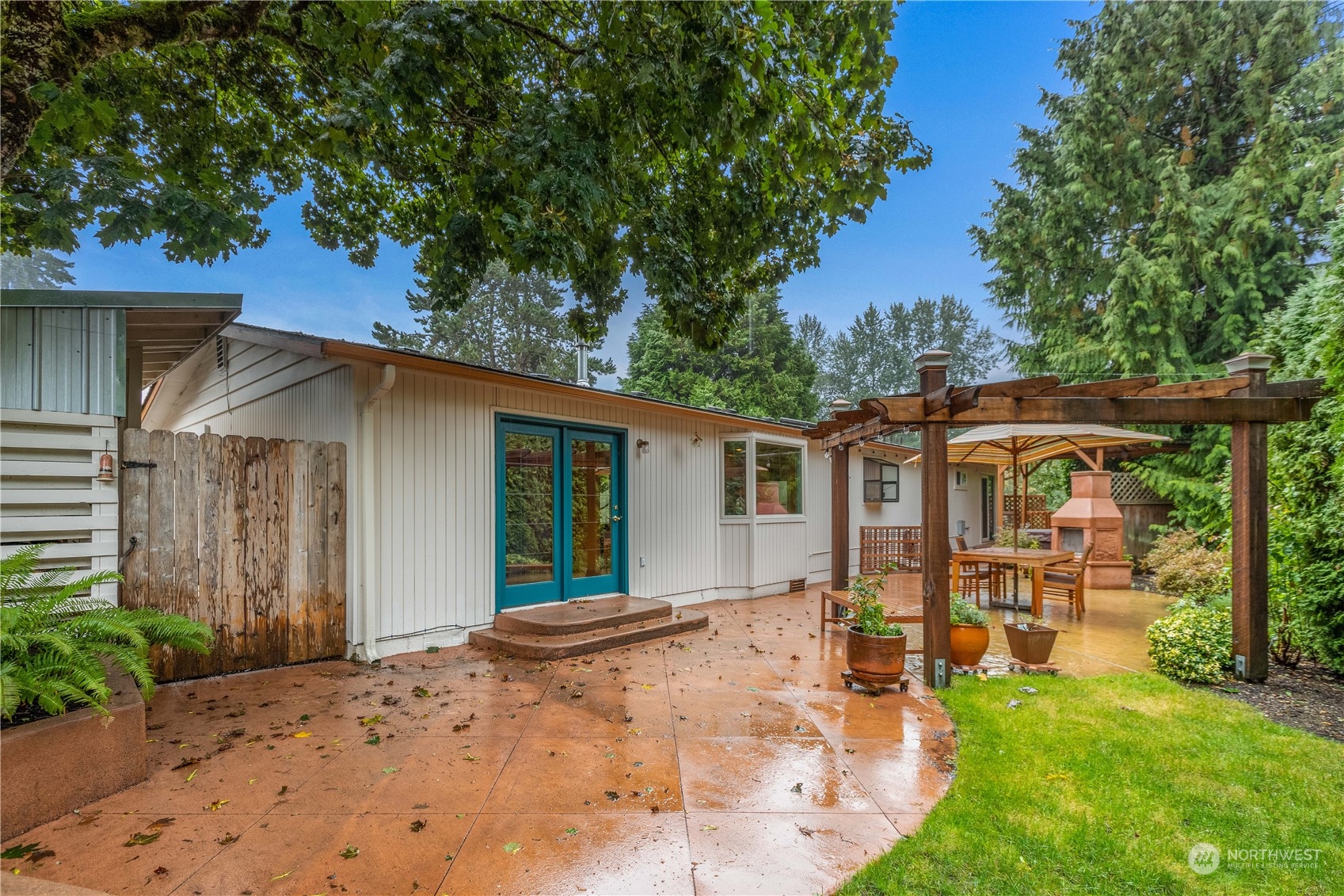 1801 224th Street Southwest Bothell, WA 98021 - Photo 17 of 24 a view of a house with a yard porch and sitting area
