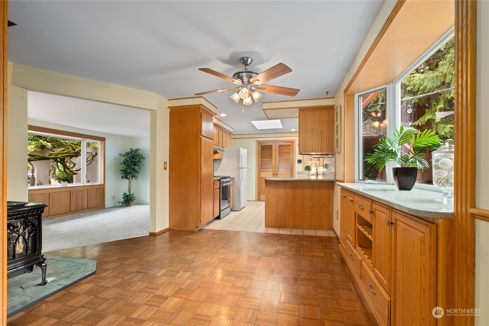 1801 224th Street Southwest Bothell, WA 98021 - Photo 8 of 24 a large white kitchen with a large window