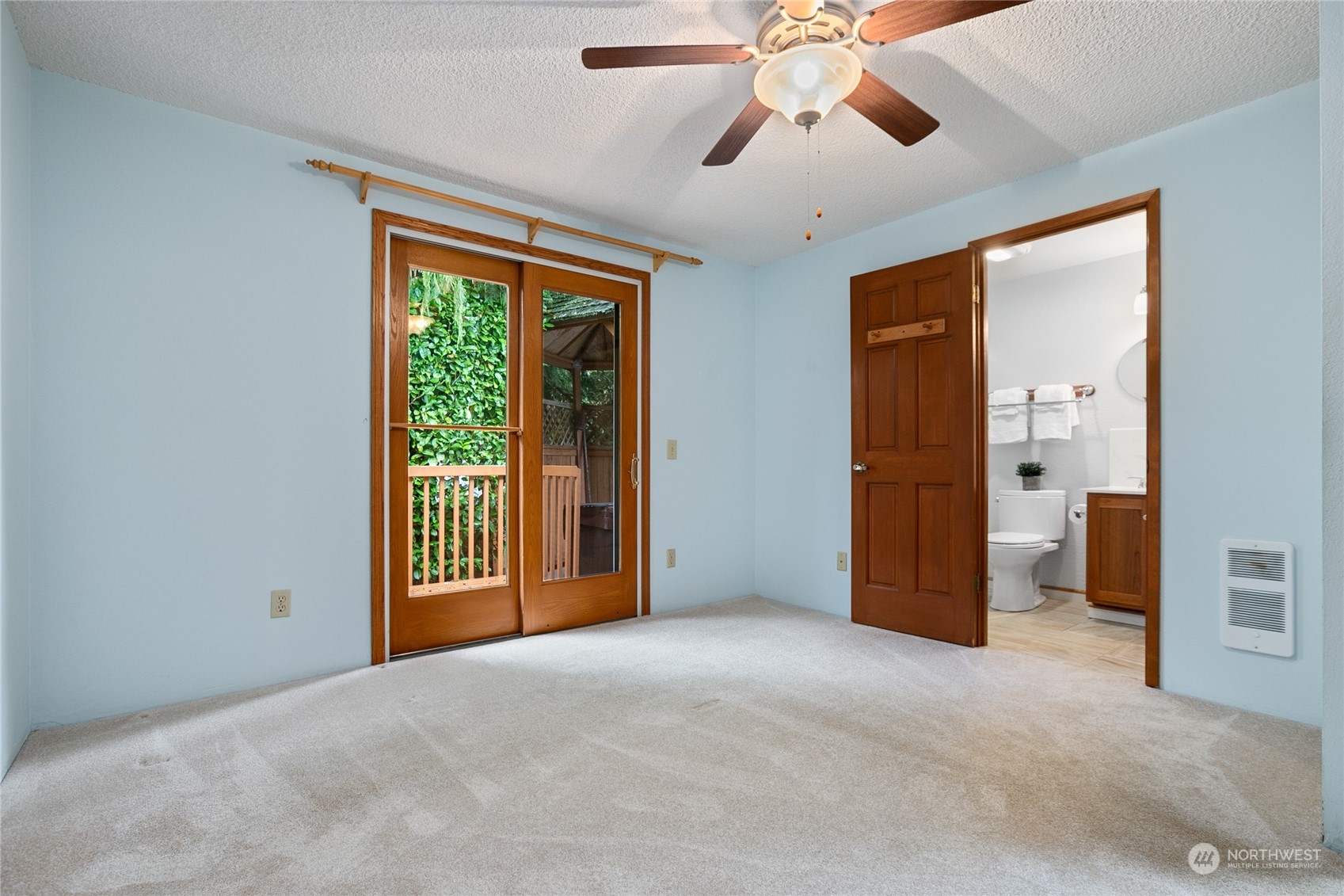 1801 224th Street Southwest Bothell, WA 98021 - Photo 10 of 24 a view of a room with a ceiling fan and a window