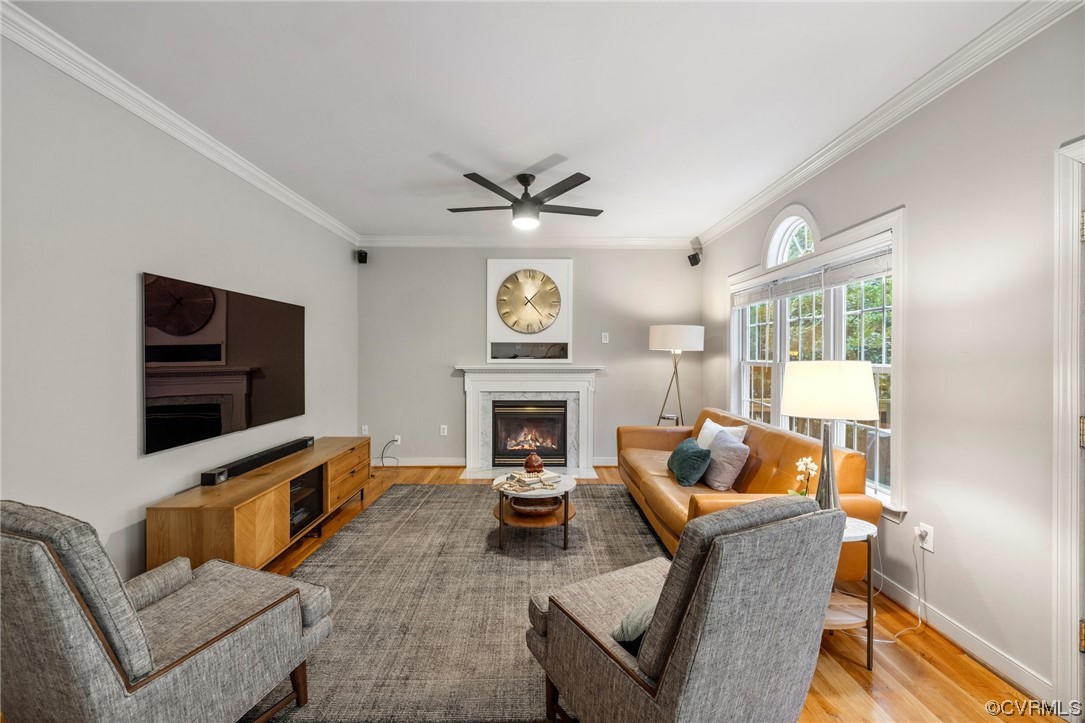 2540 Dunham Road Henrico, VA 23233 - Photo 13 of 40 a living room with furniture a fireplace and a flat screen tv