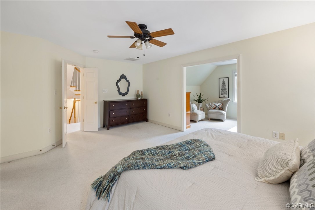 2540 Dunham Road Henrico, VA 23233 - Photo 20 of 40 a bedroom with a bed and wooden floor