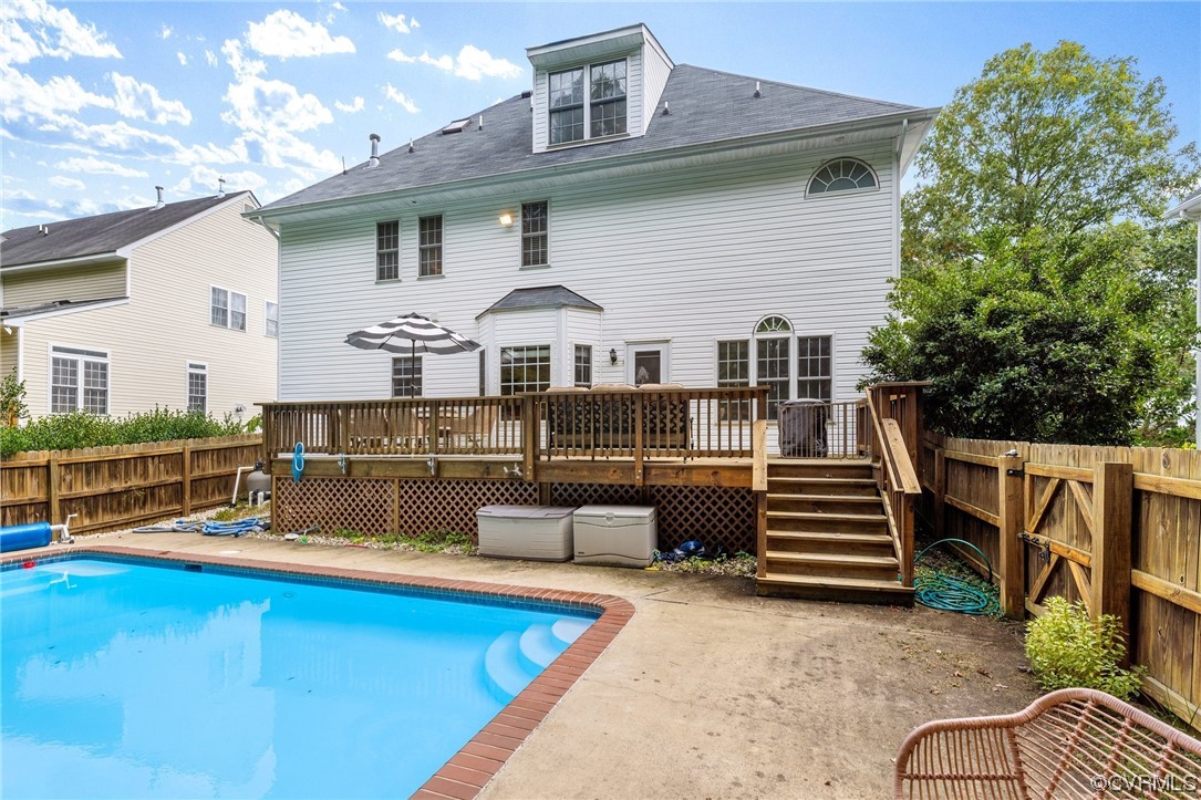 2540 Dunham Road Henrico, VA 23233 - Photo 36 of 40 a view of a house with pool chairs and wooden floor