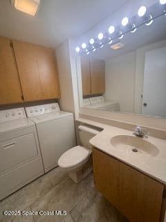 7002 70th Way, Unit 7002 West Palm Beach, FL 33407 - Photo 19 of 39 a bathroom with a sink a toilet and mirror