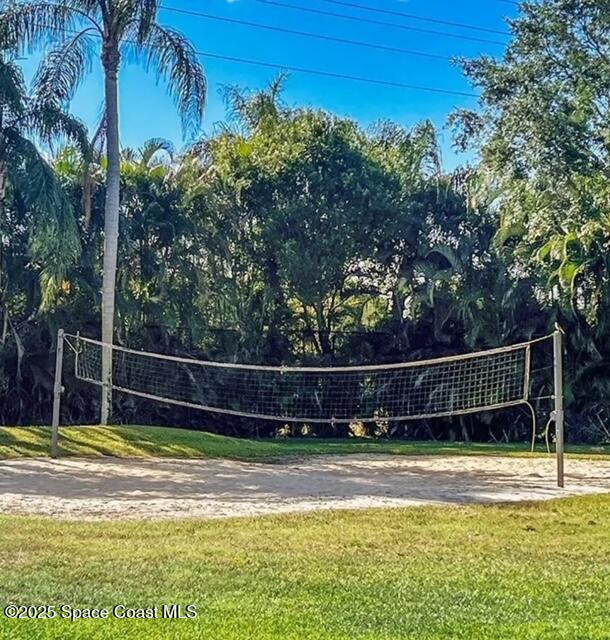 7002 70th Way, Unit 7002 West Palm Beach, FL 33407 - Photo 34 of 39 a view of a tennis court