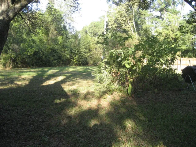 a view of a golf course with a lake