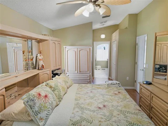 a bathroom with a shower curtain and a window