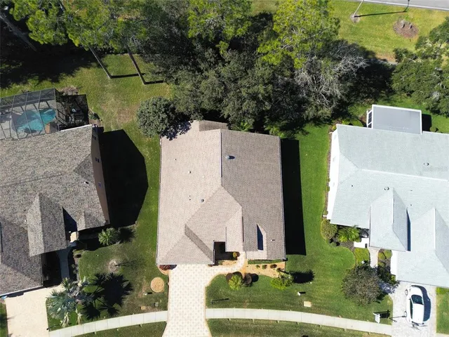 a room with furniture and pool table