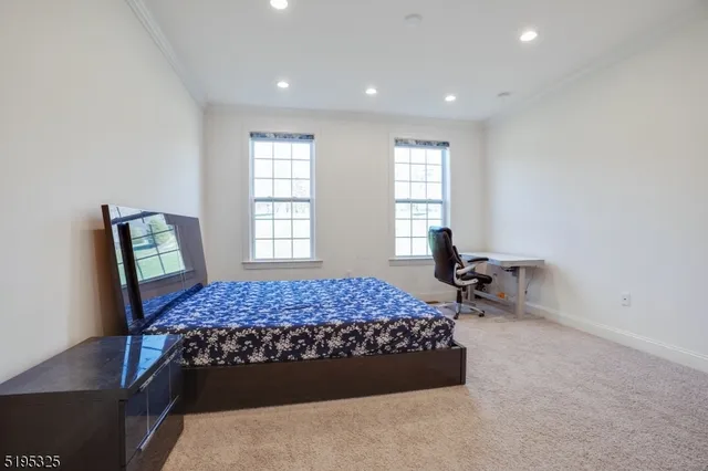 a spacious bathroom with a double vanity sink mirror and