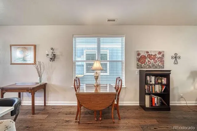 a view of a room with furniture window and wooden floor