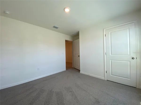 an empty room with an entryway