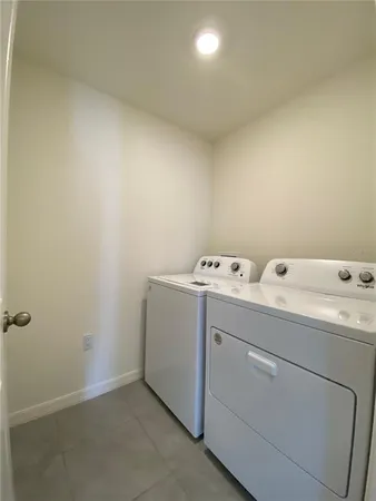 a view of an empty room with garage