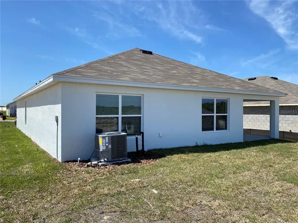 front view of a house with an outdoor space