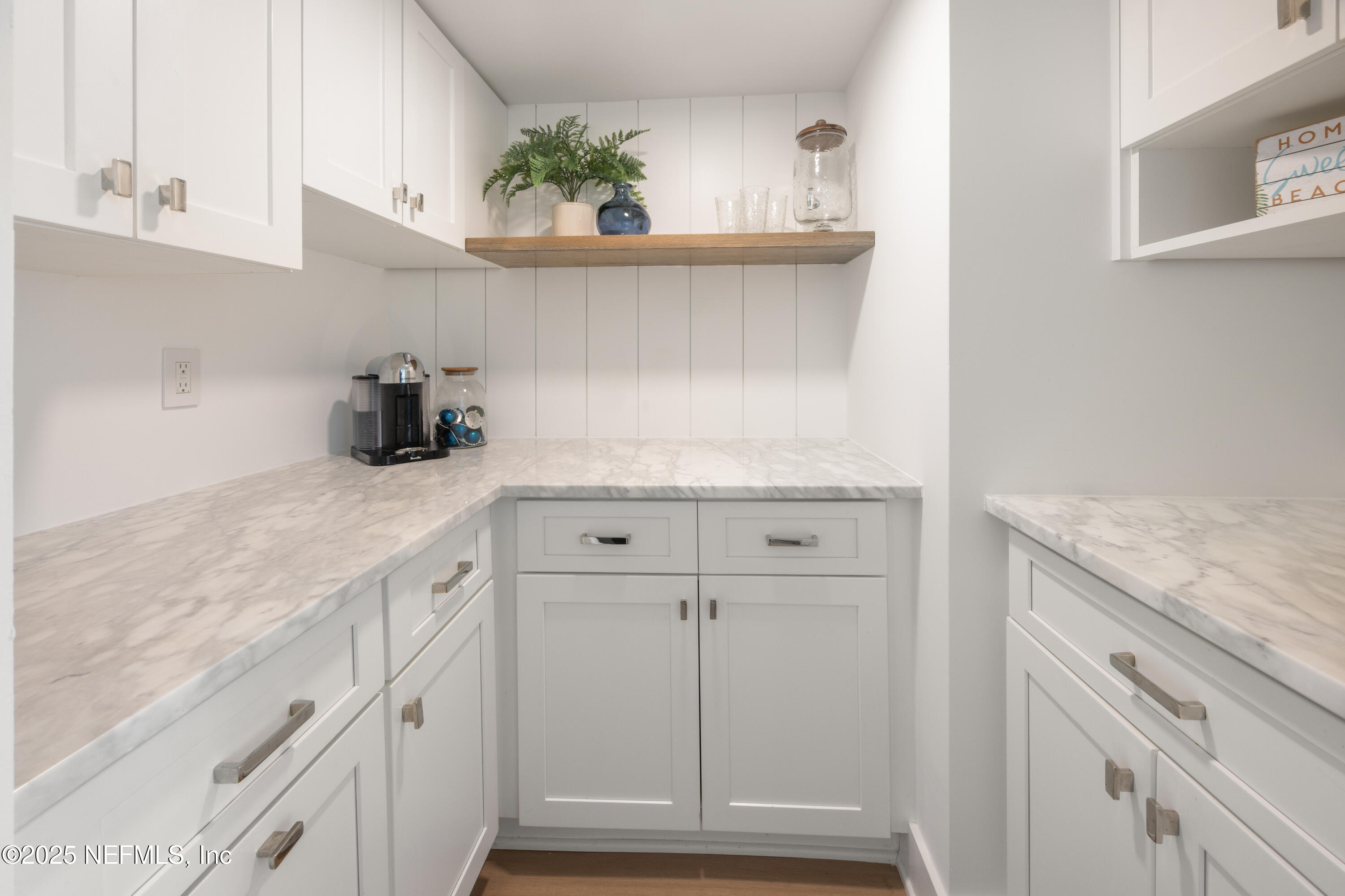 2277 Seminole Road, Unit M Atlantic Beach, FL 32233 - Photo 23 of 49 a kitchen with granite countertop white cabinets and a sink