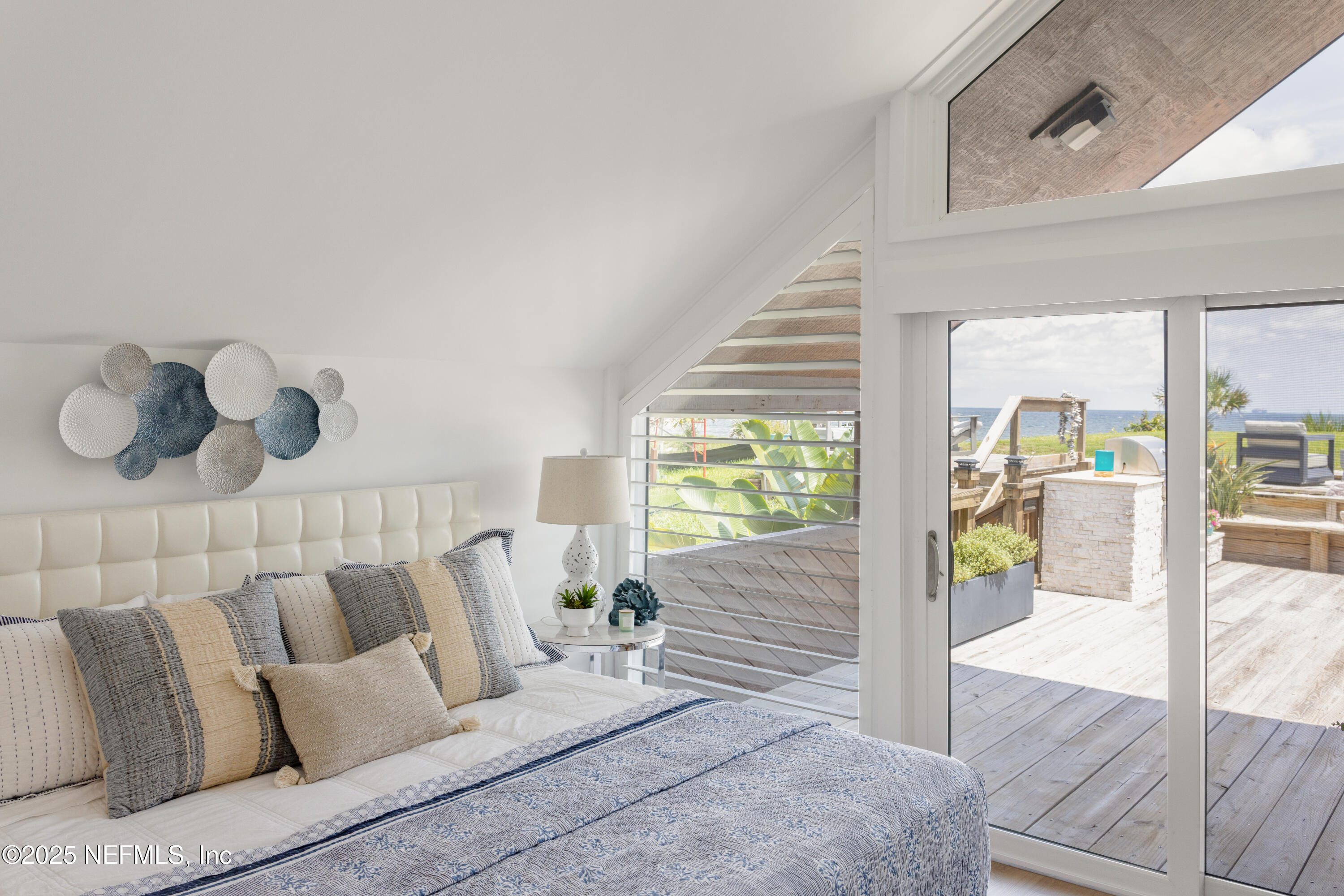 2277 Seminole Road, Unit M Atlantic Beach, FL 32233 - Photo 26 of 49 a living room with furniture and a large window