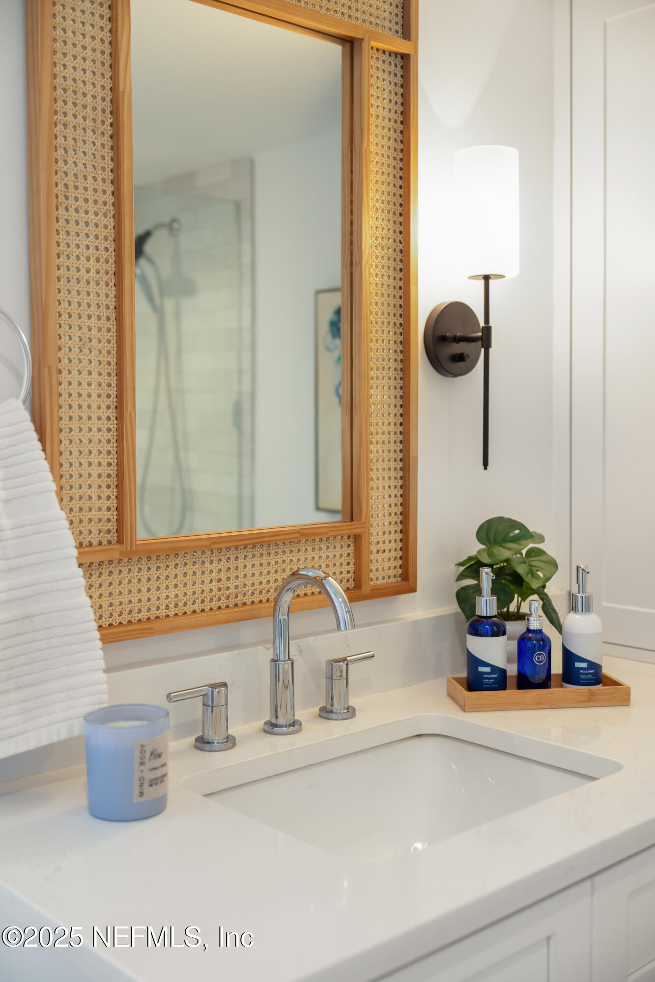 2277 Seminole Road, Unit M Atlantic Beach, FL 32233 - Photo 27 of 49 a bathroom with a sink and a mirror