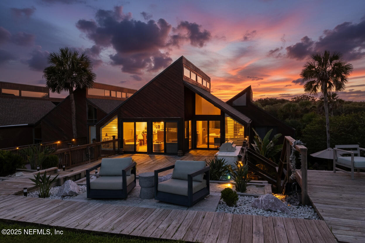2277 Seminole Road, Unit M Atlantic Beach, FL 32233 - Photo 45 of 49 a roof deck with table and chairs potted plants with wooden floor