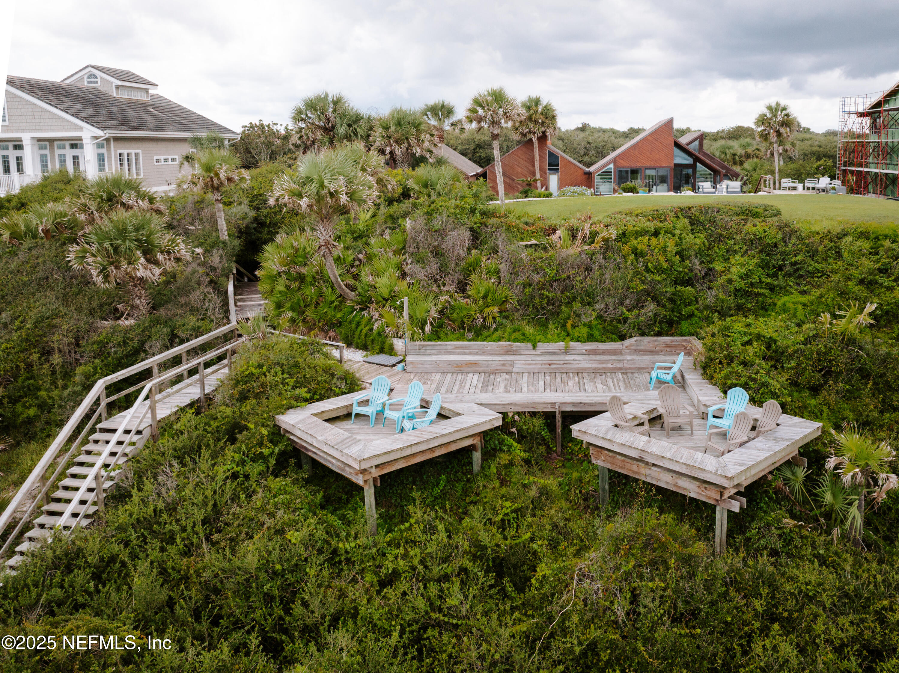 2277 Seminole Road, Unit M Atlantic Beach, FL 32233 - Photo 49 of 49 a view of a house with pool and chairs
