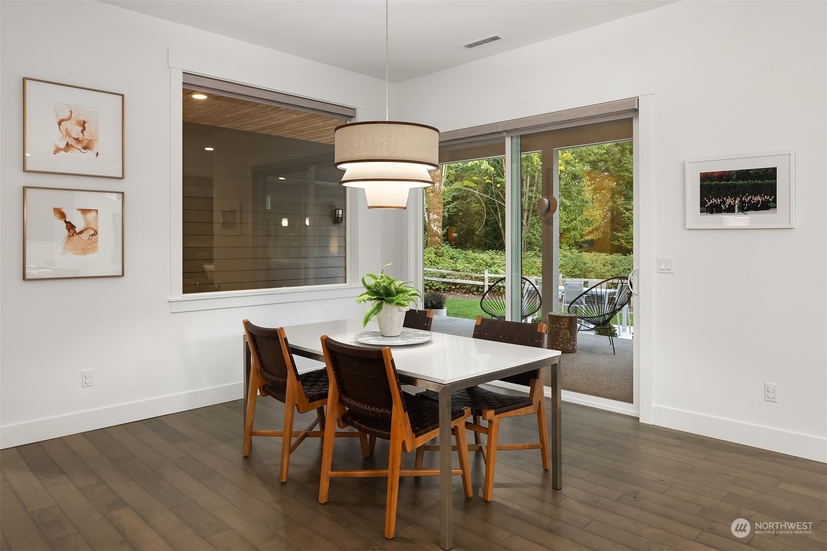 36234 Southeast Fish Hatchery Road Fall City, WA 98024 - Photo 11 of 40 a view of a dining room with furniture window and wooden floor