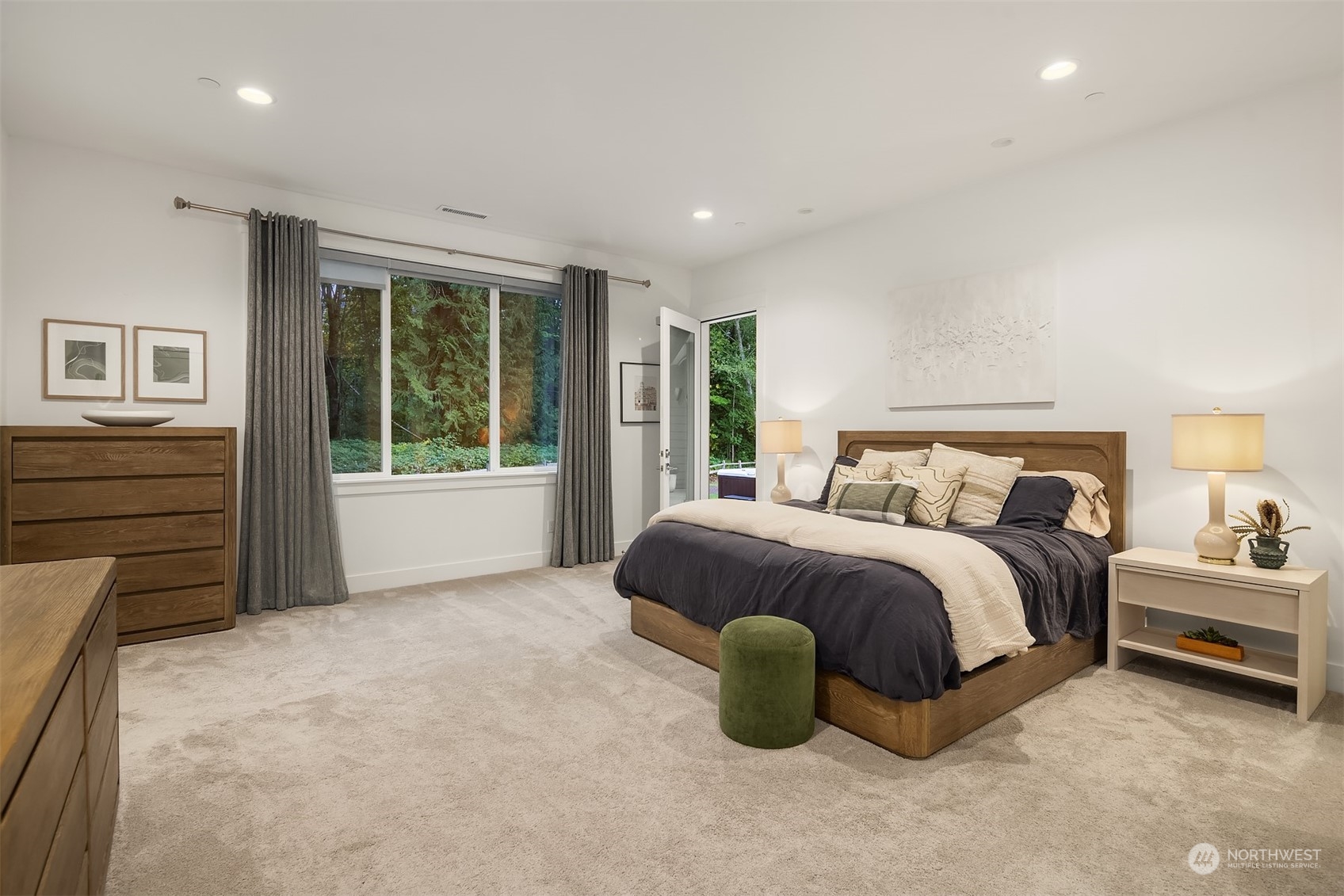 36234 Southeast Fish Hatchery Road Fall City, WA 98024 - Photo 15 of 40 a spacious bedroom with a bed and a window